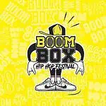 BOOM BOX hip hop festival with music box illustration and figure wearing sneakers on vibrant yellow background.