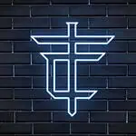 黑色砖墙上的霓虹灯勾勒出美元符号的轮廓，突显了哥伦比亚数字活动和企业中的创新、金融和创业精神。