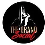 舞台上的活动工作人员手持麦克风，参加社交活动和职业人脉拓展活动。The Grand Social 的标志采用黑色圆形设计，人物和文字采用白色、橙色和红色。