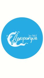 AeroParque logo con olas de agua y texto en azul y blanco, representando eventos y actividades acuáticas en Colombia.