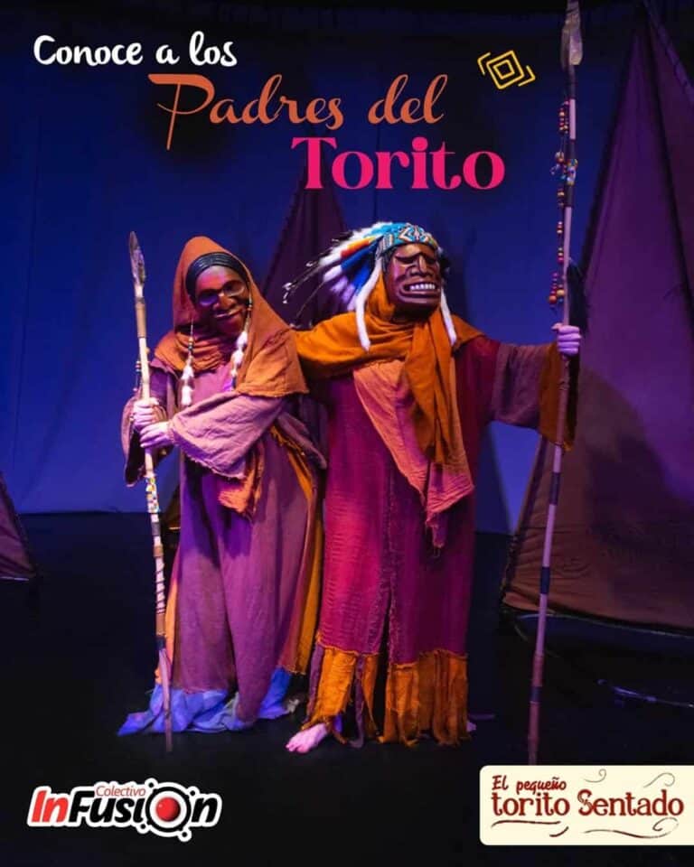 Murales de padres del torito en una presentación teatral con disfraces y accesorios culturales. Imagen representando la tradición y folklore en eventos culturales y teatro en Colombia.