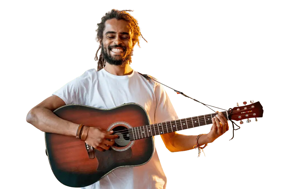 A smiling guitarist playing an acoustic guitar at a live music event in Bogotá, promoting entertainment and musical culture at corporate and social events.
