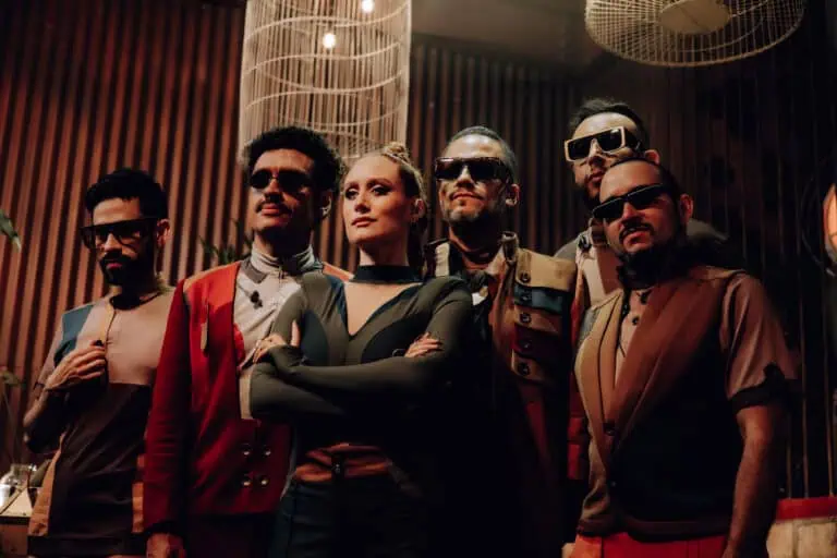 Futuristic costumes and cosplay at a tech event with people wearing 3D glasses, in a modern and sophisticated environment for promotions and immersive experiences.
