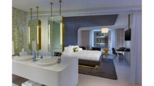 Habitación moderna en Bogotá con diseño elegante y comodidades premium, ideal para eventos y alojamiento de negocios o turismo en la ciudad.